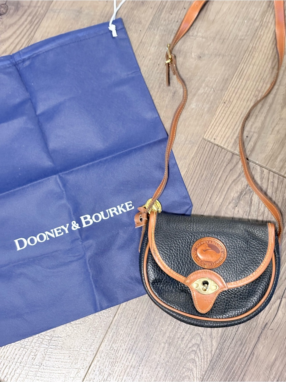 Dooney & Bourke Black Pebbled Leather Crossbody with Brown Trim and Strap